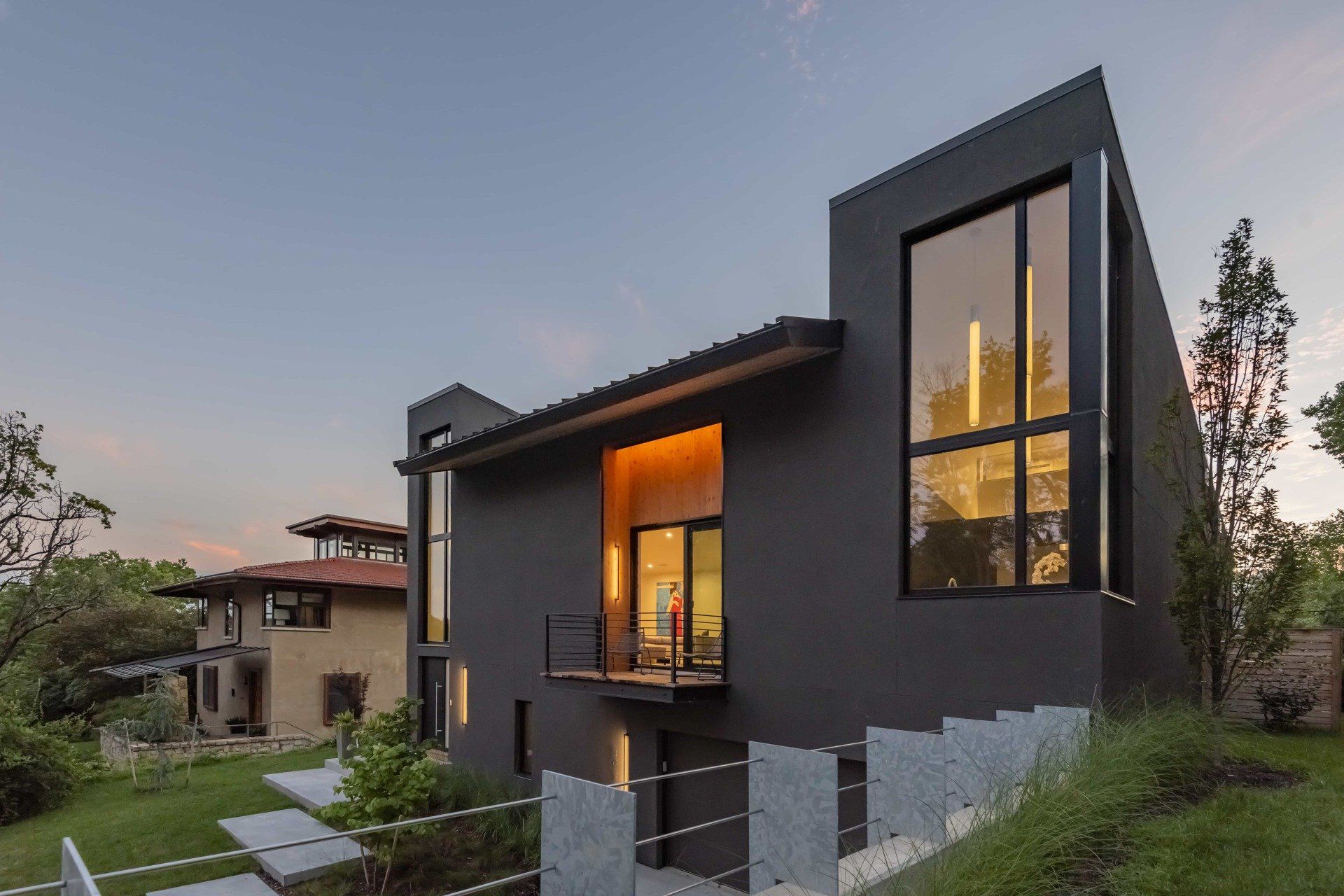 Large, grey, modern homoe with large windows