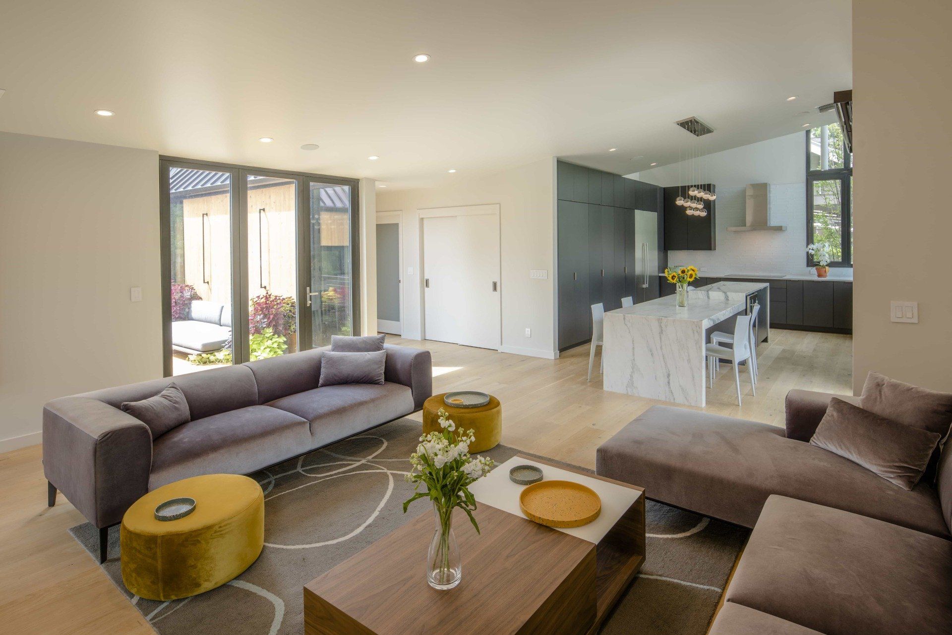 Modern but cozy living room with lots of natural light