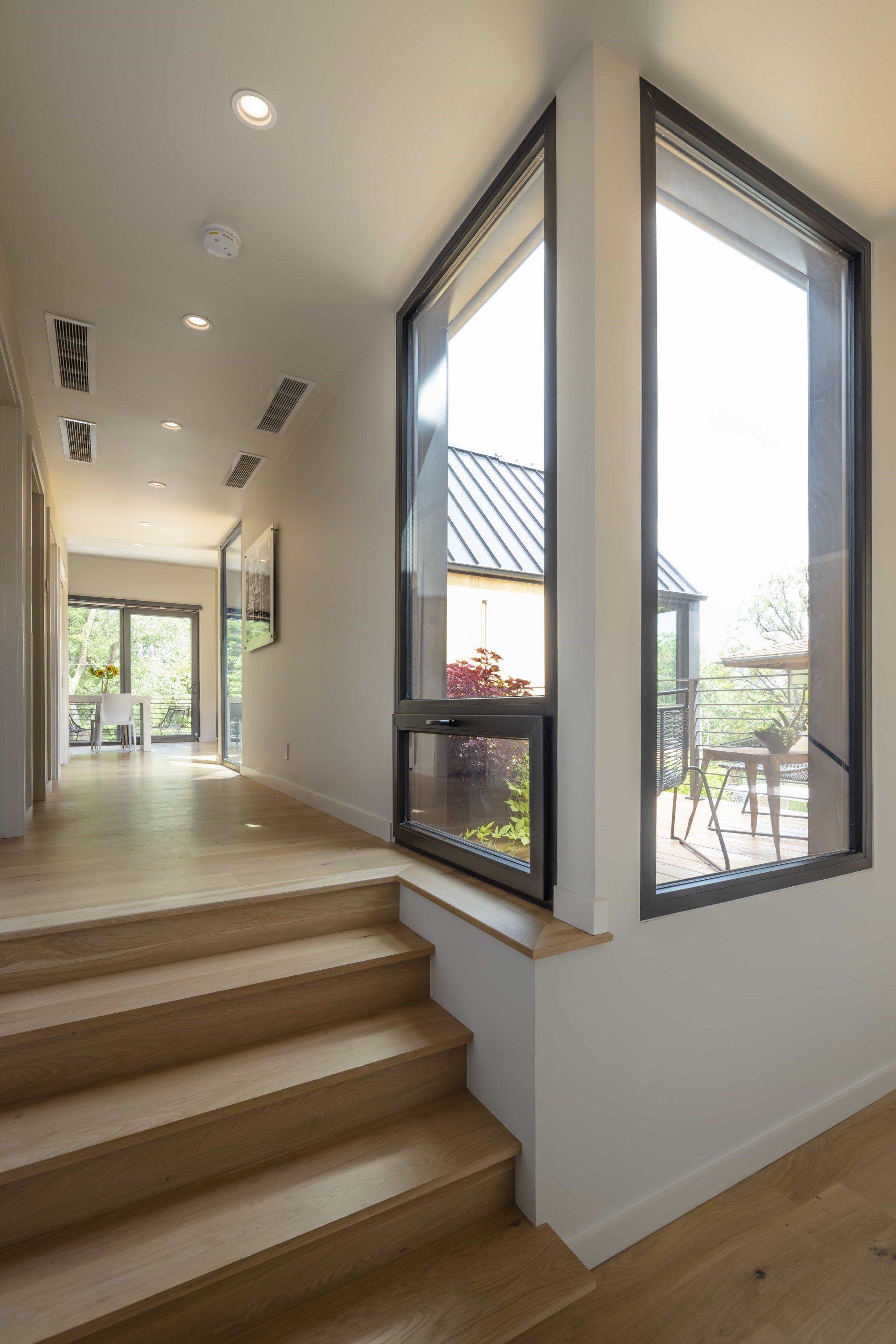 Small staircase and a view out corner windows