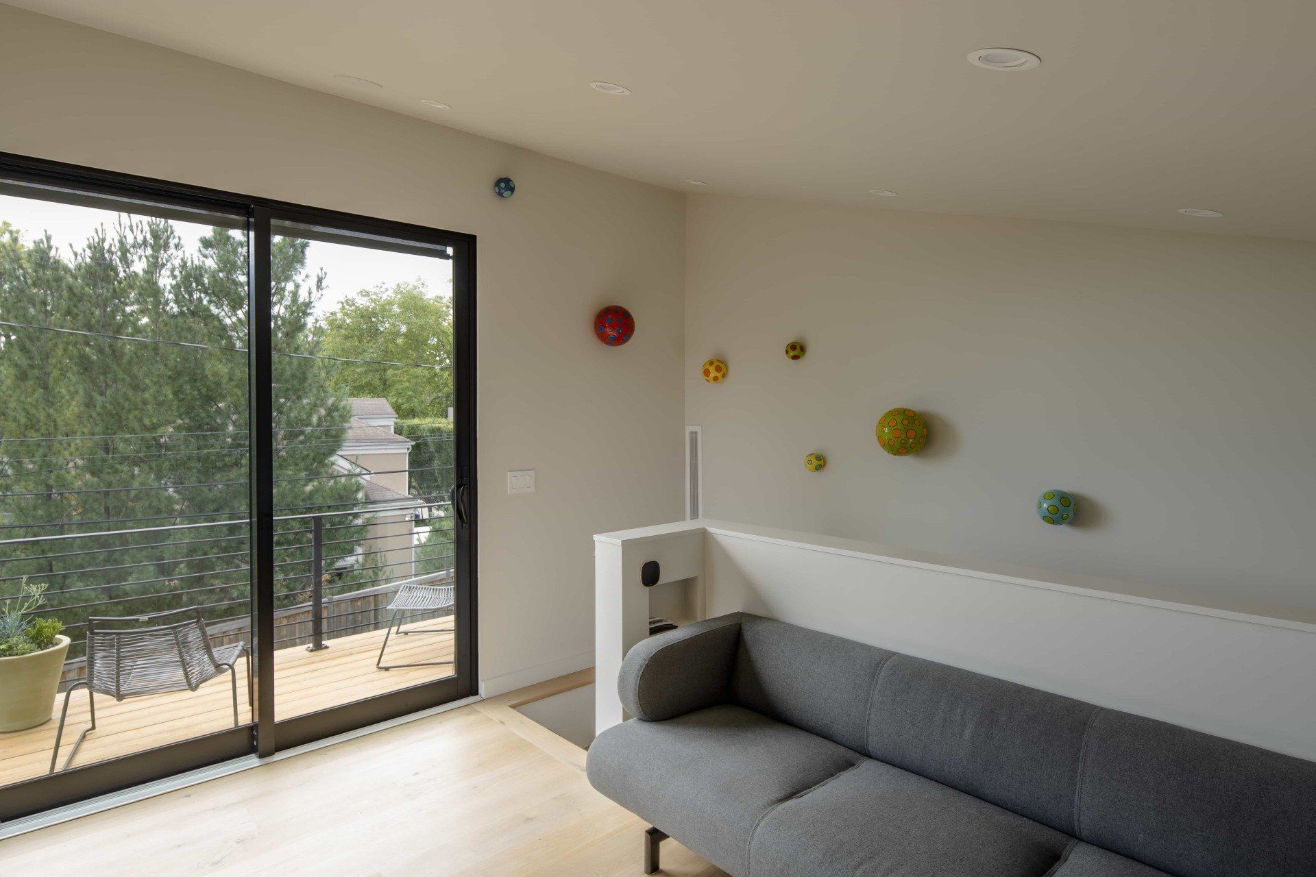 View out sliding glass doors at top of staircase