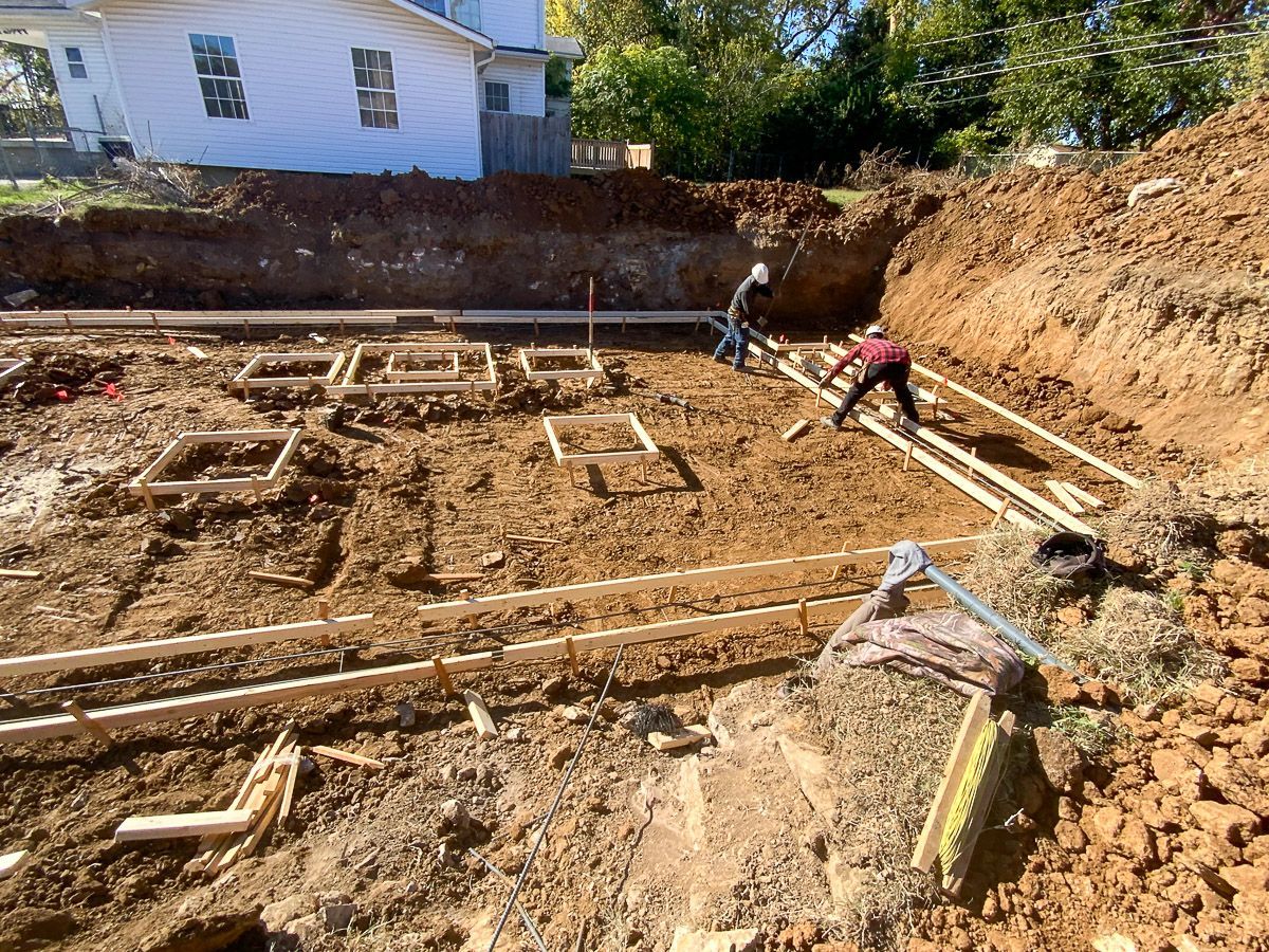 Foundation footings formed with wood at a job site for a new custom home