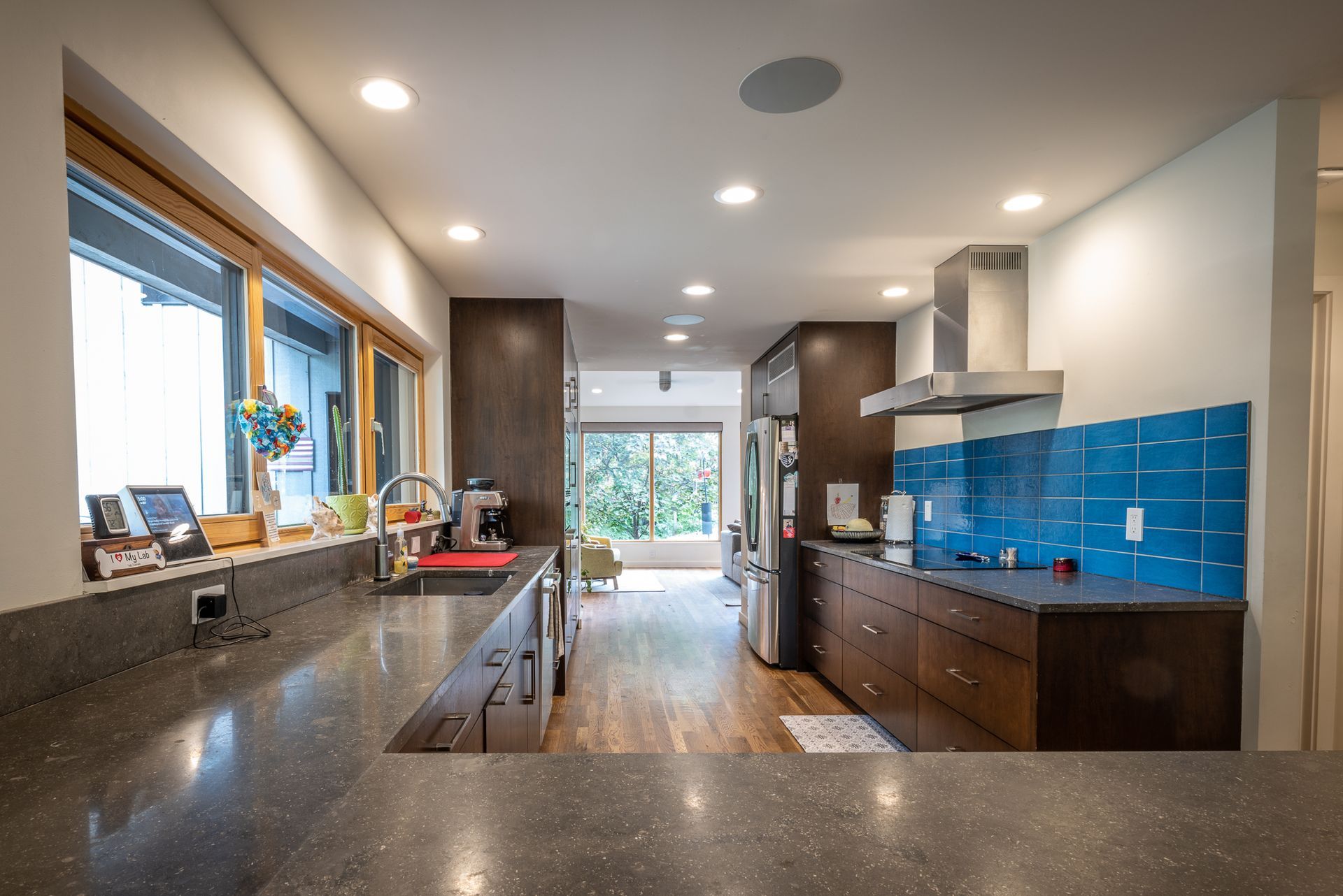 L shaped kitchen counters with view of living room
