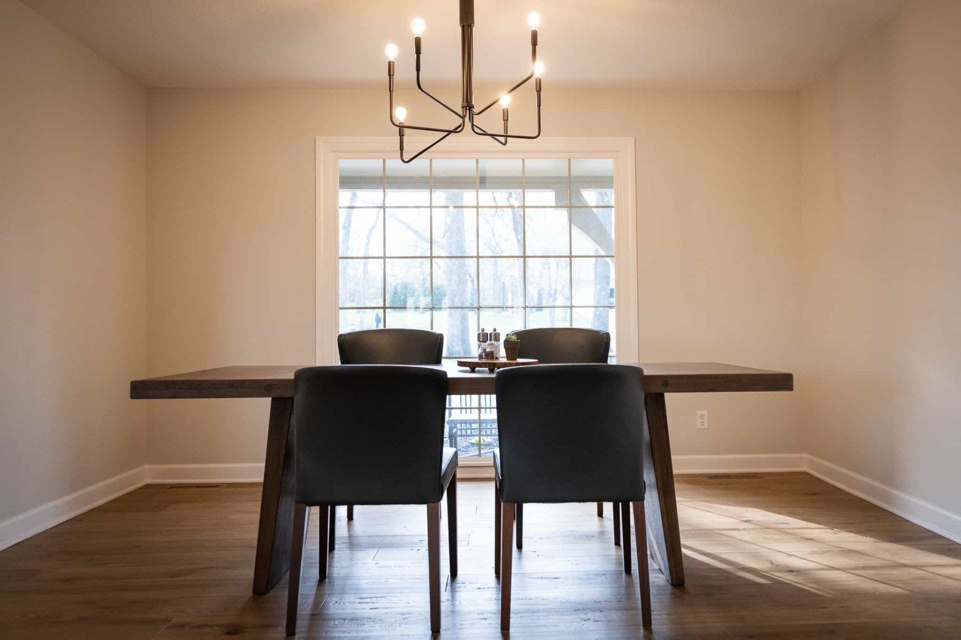Dining room with simple table and light fixture