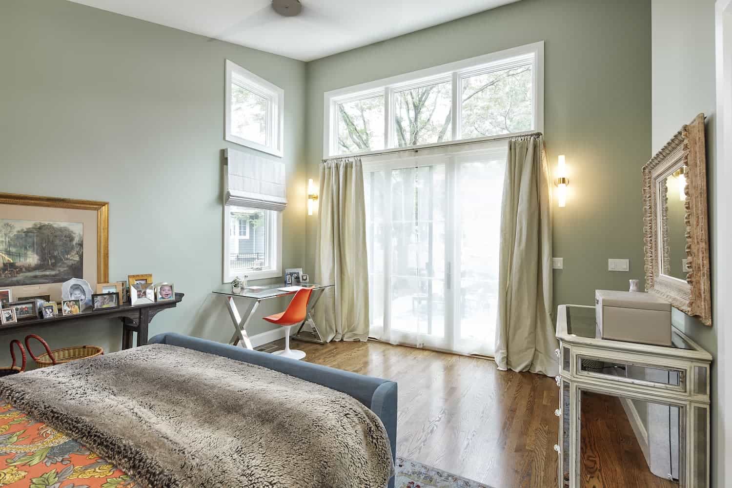 Large bedroom with big windows letting light in