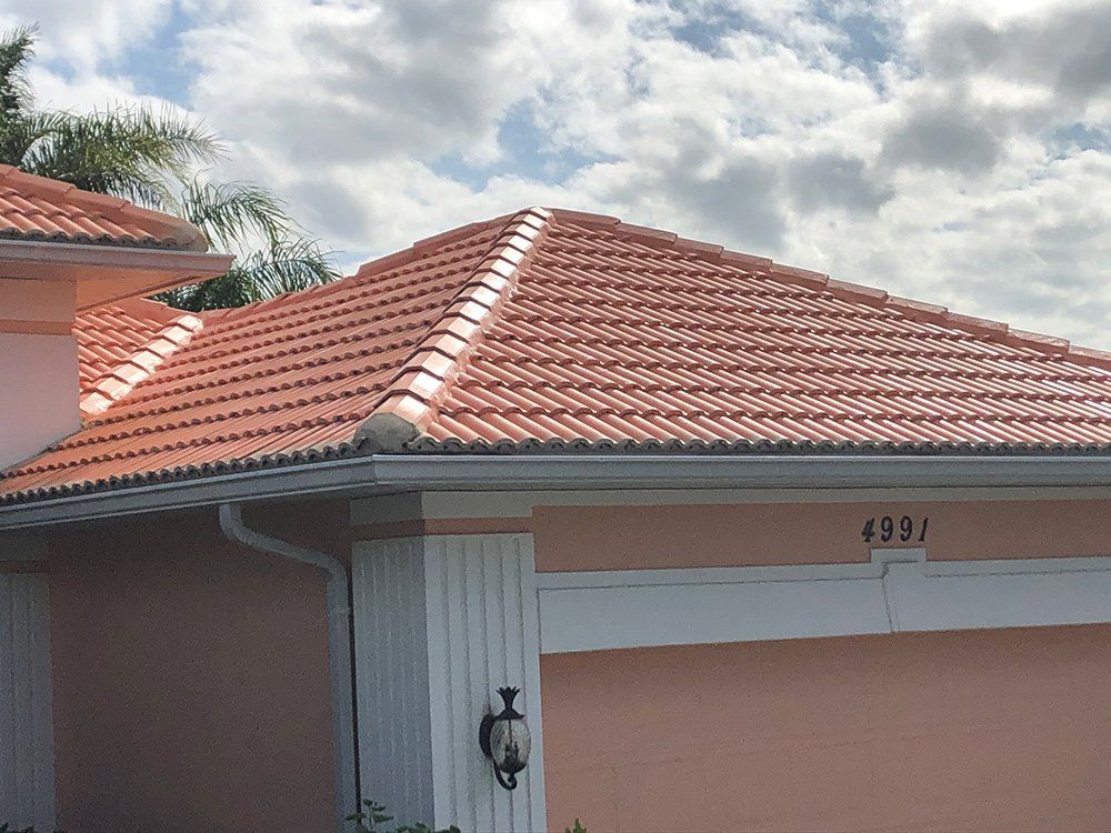 Newly Painted Tile Roof — Venice, FL — A-1 Roof Cleaning & Coating of Venice
