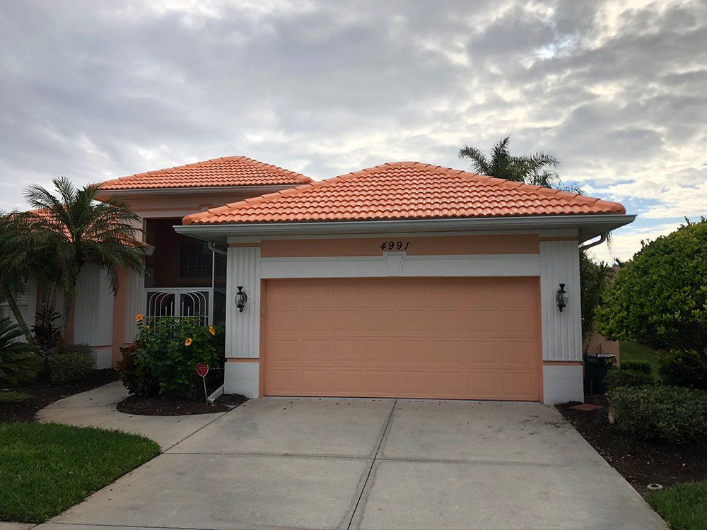 Residential House with Clean Tile Roof — Venice, FL — A-1 Roof Cleaning & Coating of Venice