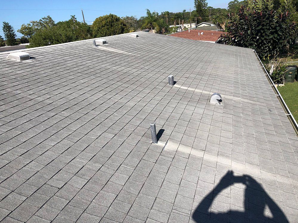 Roof with Three Chimney Pipe — Venice, FL — A-1 Roof Cleaning & Coating of Venice