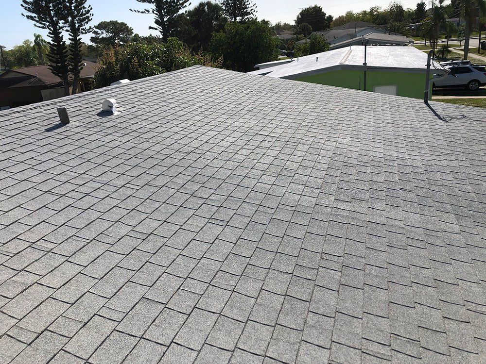 Shingles Roof with Pipe — Venice, FL — A-1 Roof Cleaning & Coating of Venice