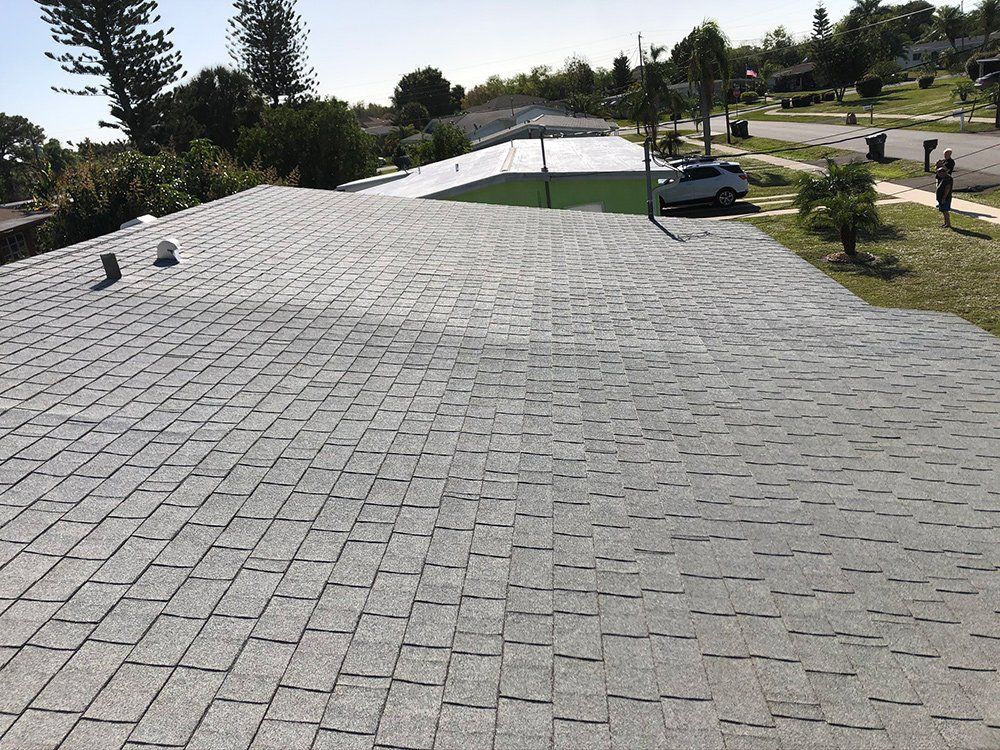 Shingles Roofing Vent and Chimney Pipe — Venice, FL — A-1 Roof Cleaning & Coating of Venice