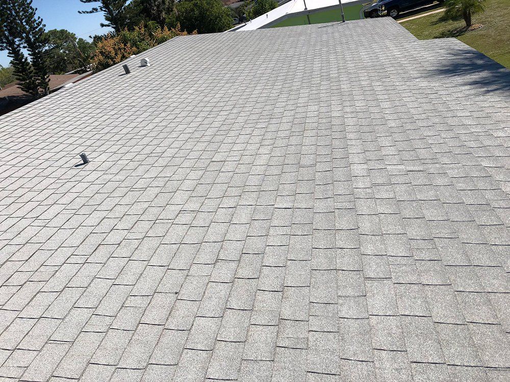 Roof with Two Chimney Pipe — Venice, FL — A-1 Roof Cleaning & Coating of Venice