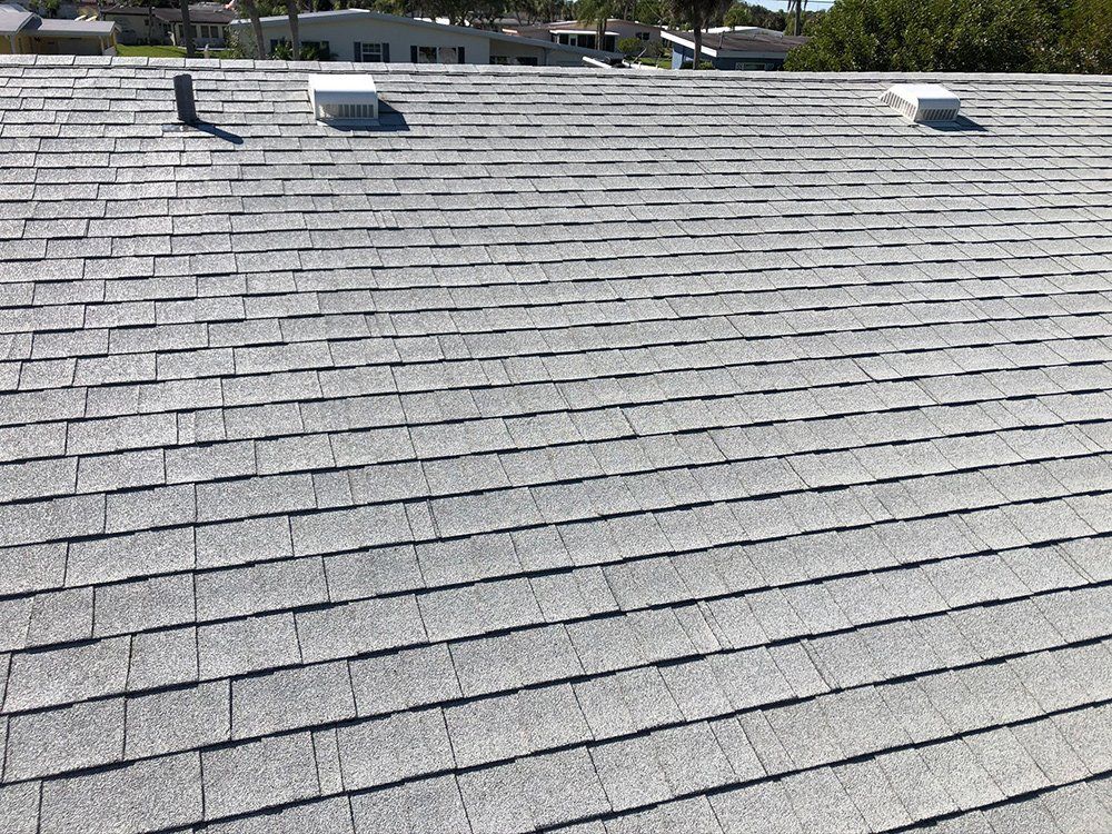 Roof with Chimney Pipe — Venice, FL — A-1 Roof Cleaning & Coating of Venice