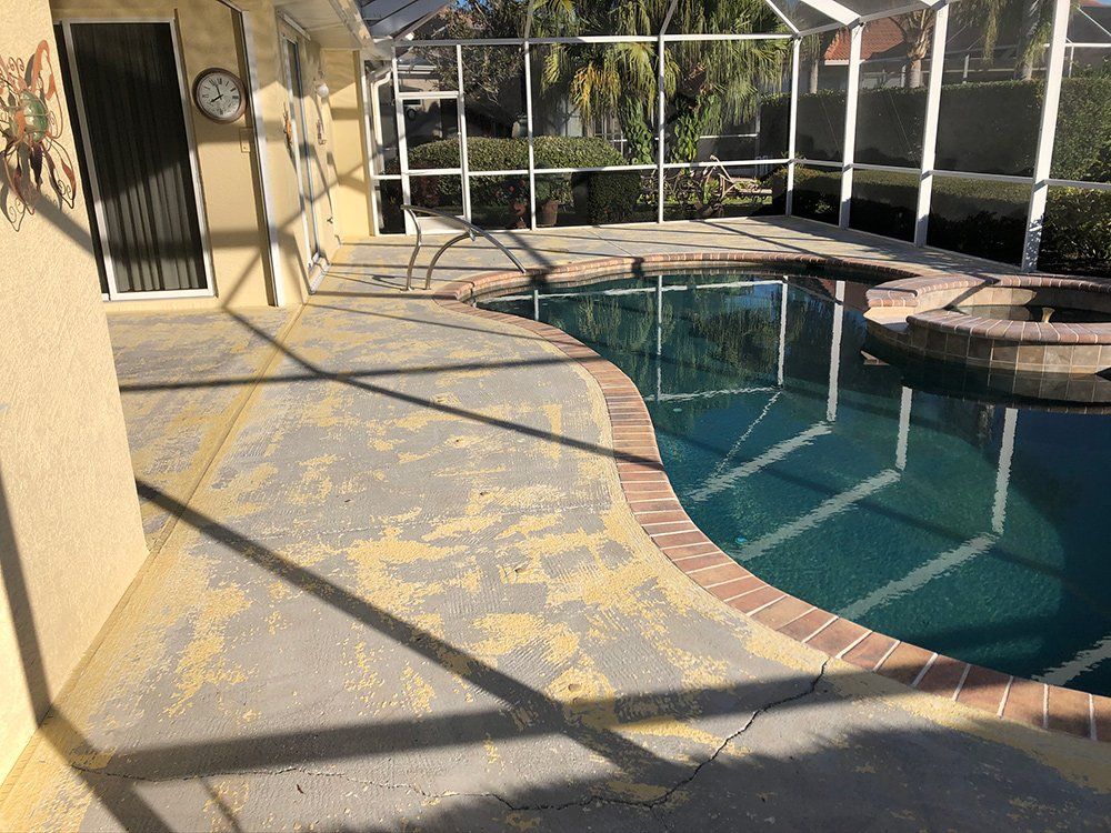 Faded Concrete Floor And Small Swimming Pool — Venice, FL — A-1 Roof Cleaning & Coating of Venice