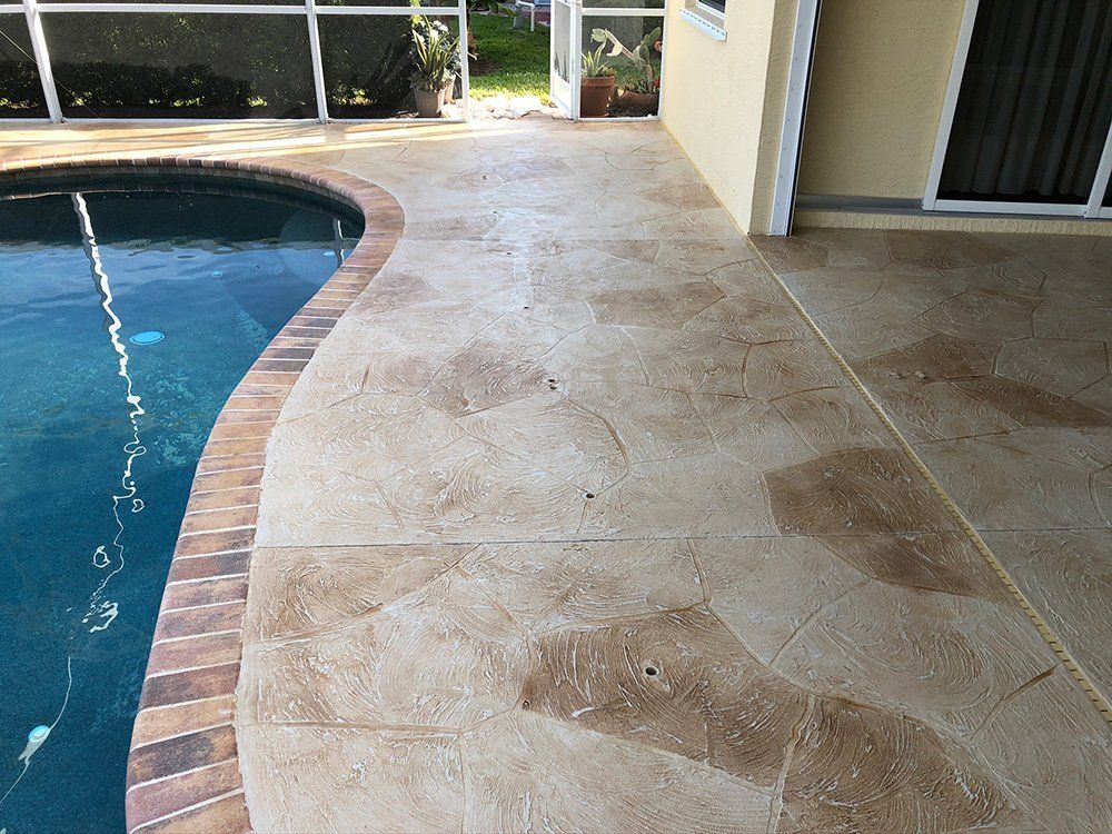 Swimming Pool Concrete Surface — Venice, FL — A-1 Roof Cleaning & Coating of Venice