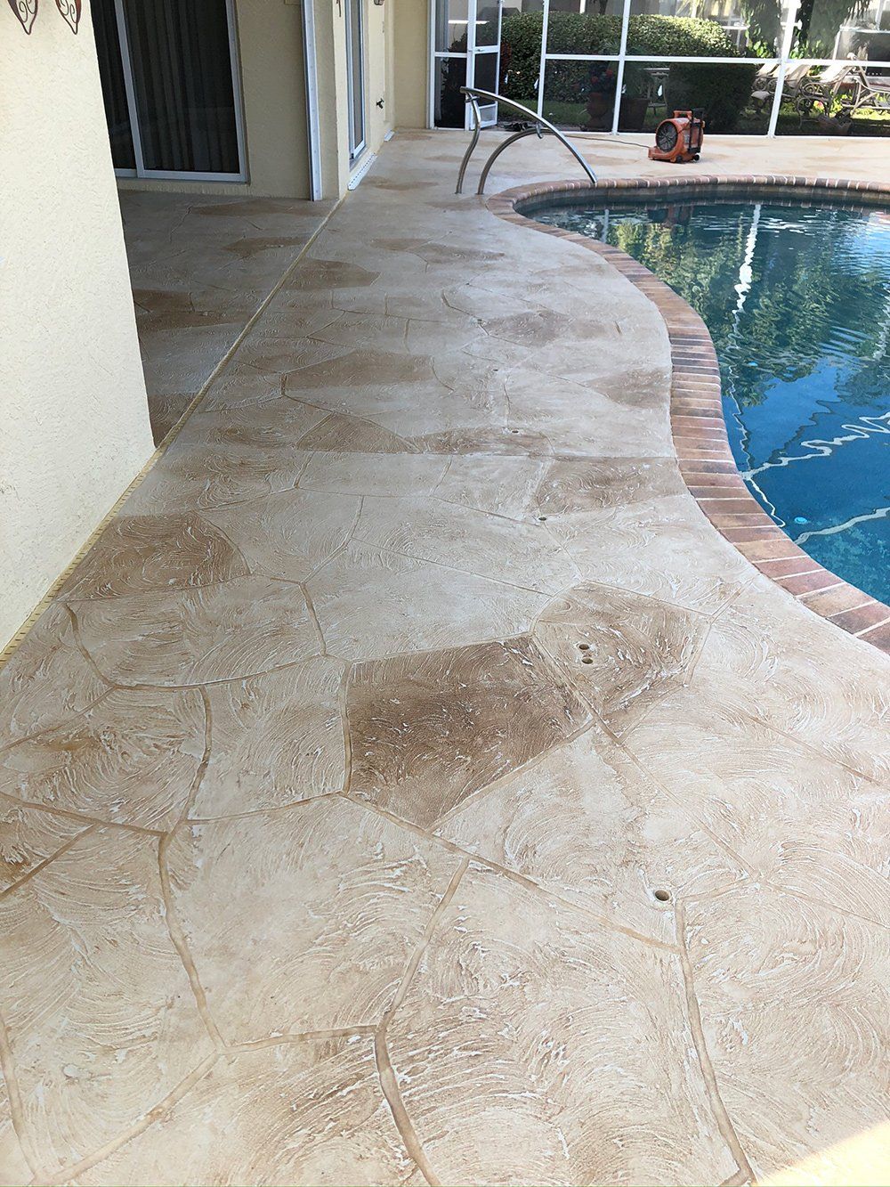 Swimming Pool Decorative Concrete Floor — Venice, FL — A-1 Roof Cleaning & Coating of Venice
