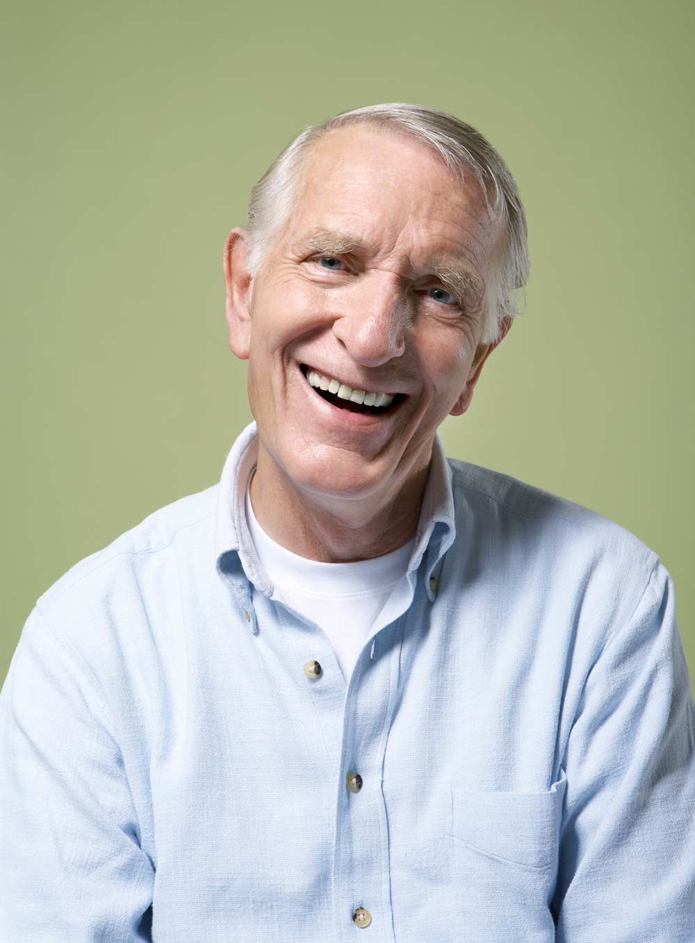 man with dentures smiling