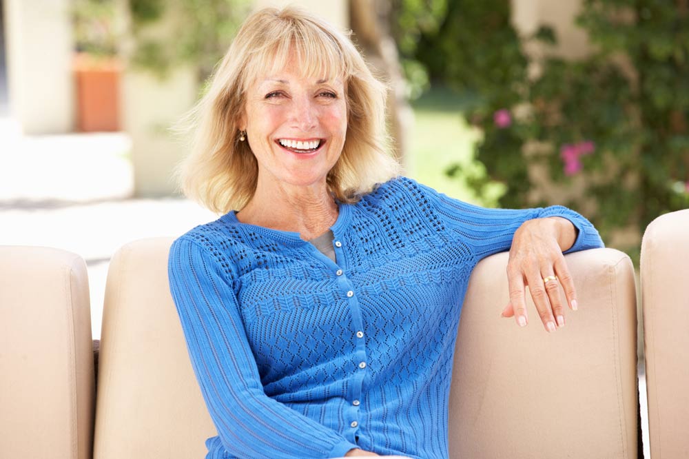 woman with dentures smiling