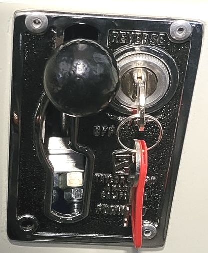 A close up of a lock with a key in it.