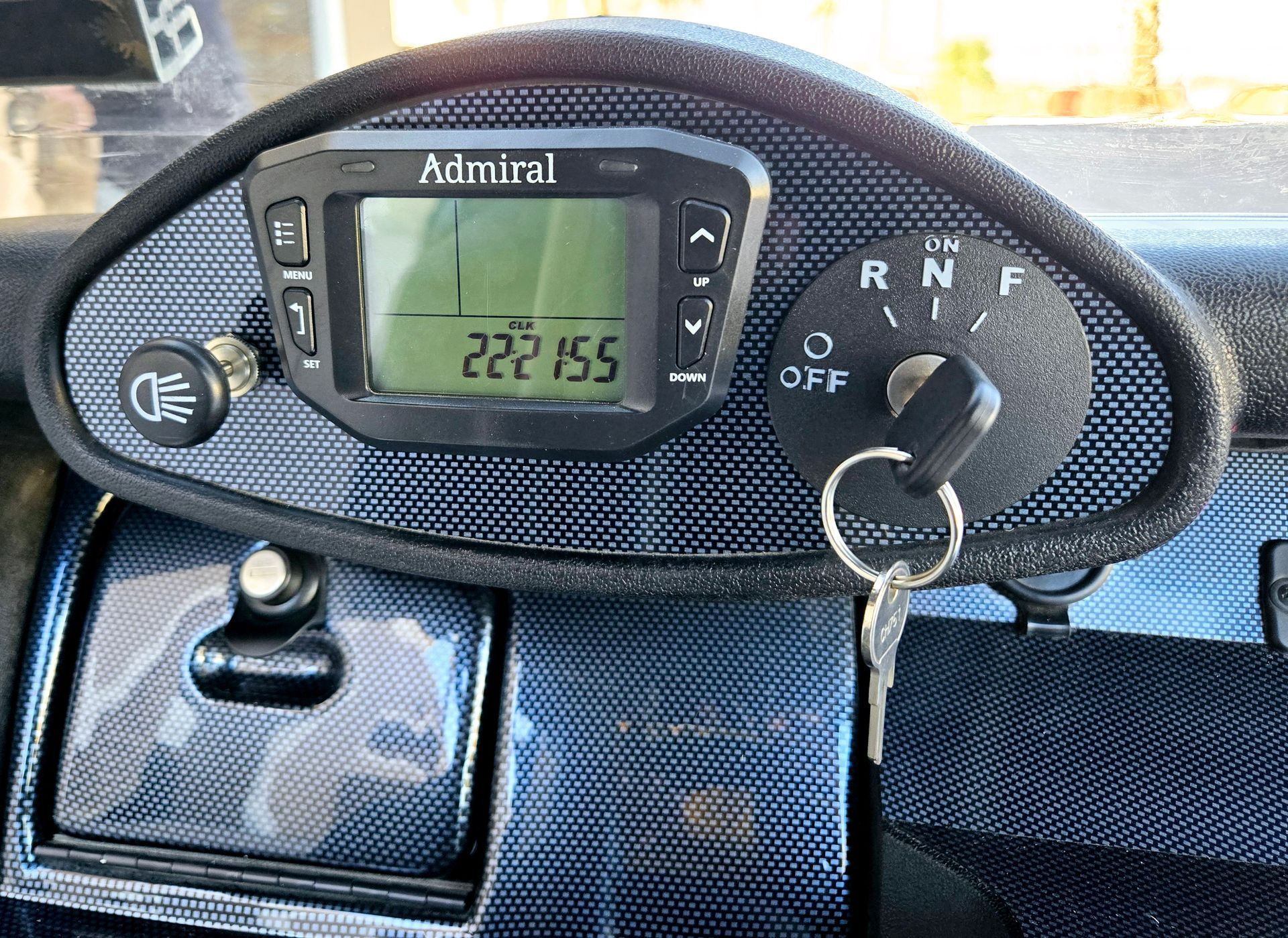 A dashboard with a digital display that says admiral on it