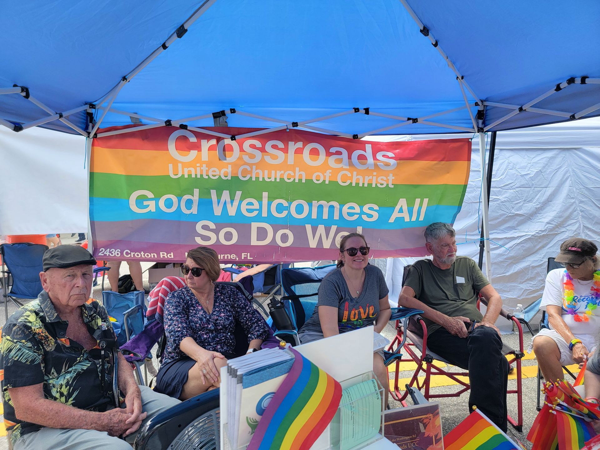 Members at the Pride booth at Space Coast Pride