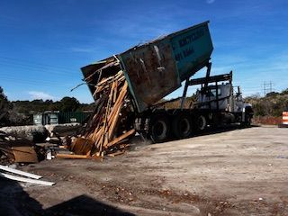 SRM OBX Dumpster Delivery OBX Dumpster Rentals OBX Disposal Services