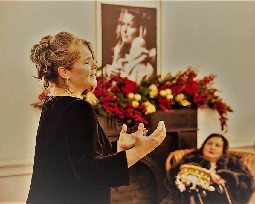 louisa singing in an opera recital