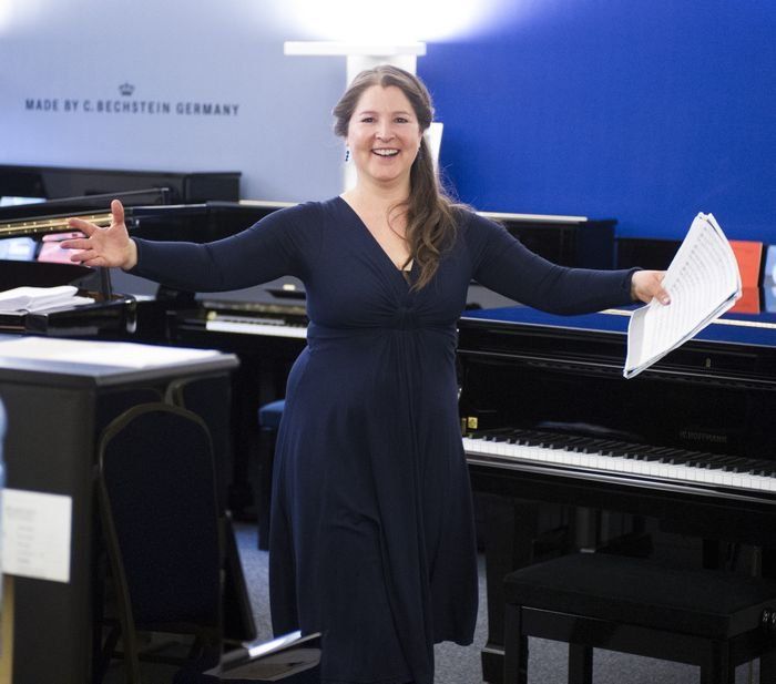 louisa beard smiling while performing