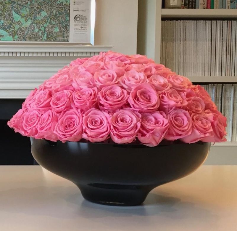 Magnificent Pink roses centrepiece in a large ceramic black bowl vase
