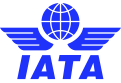 A blue logo for iata with a globe and wings on a white background.