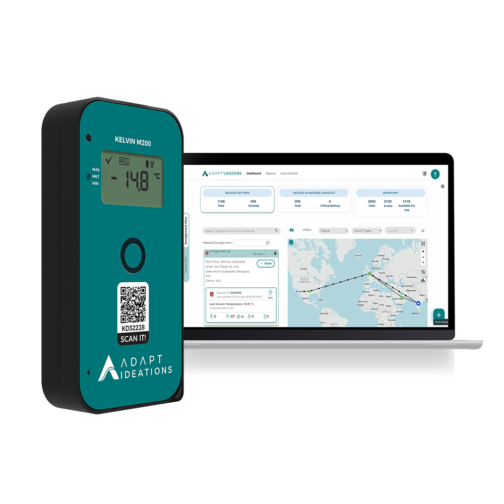 A thermometer is sitting next to a laptop computer.