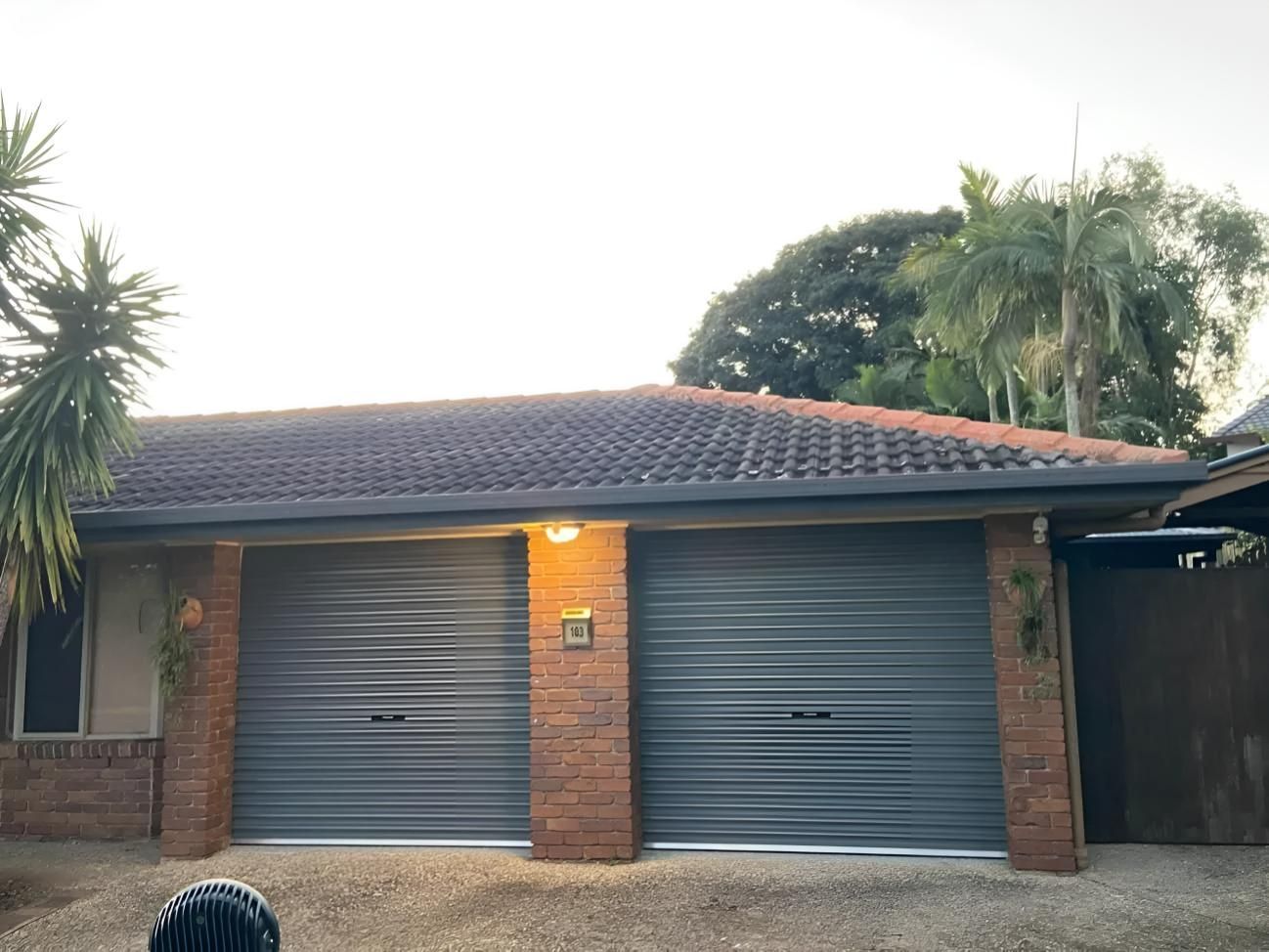 Garage With Lights on — Automated Garage Doors in Redbank Plains, QLD
