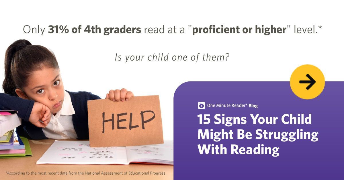 A young girl is sitting at a desk holding a sign that says help.