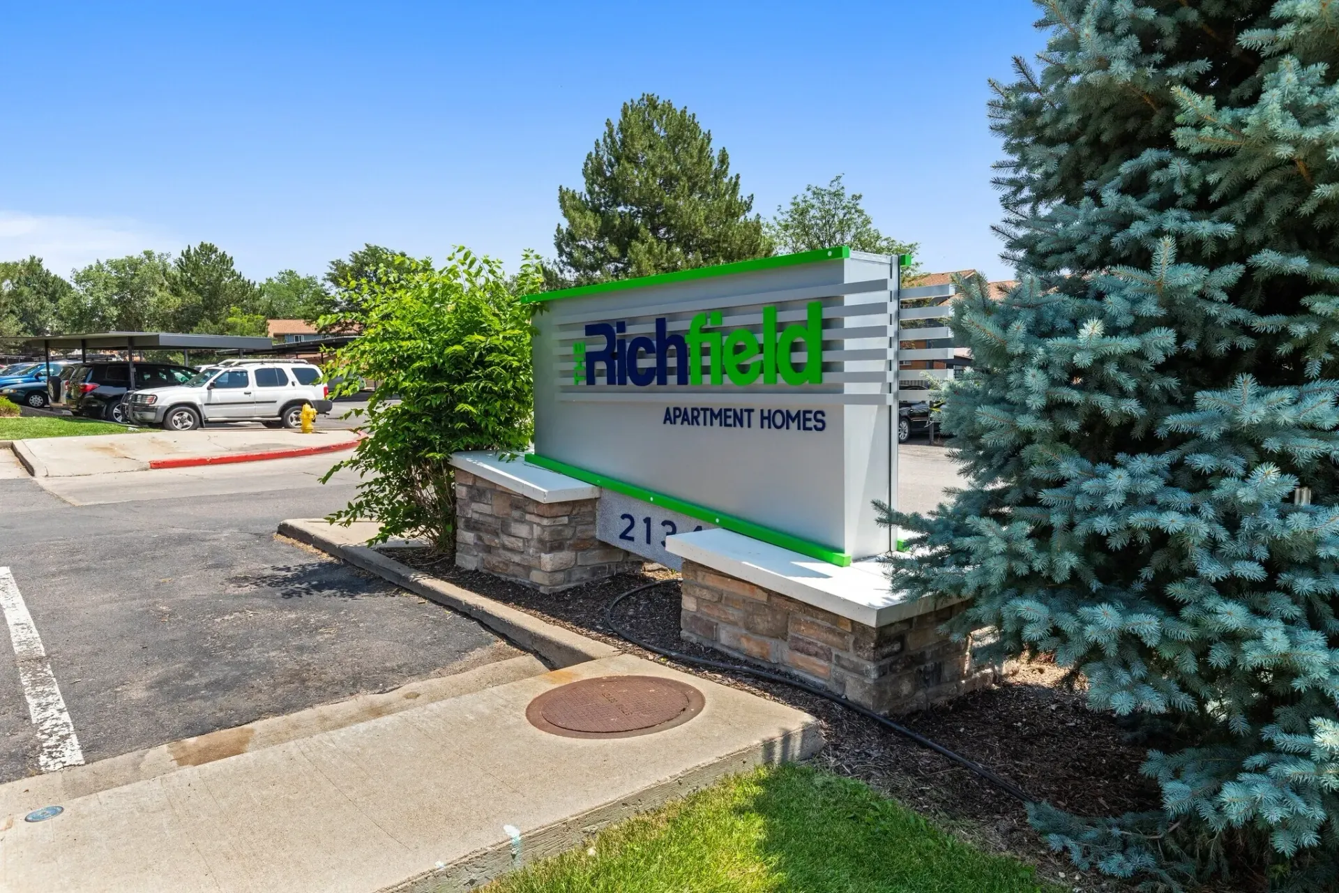 Richfield Apartment Homes monument sign with address 212