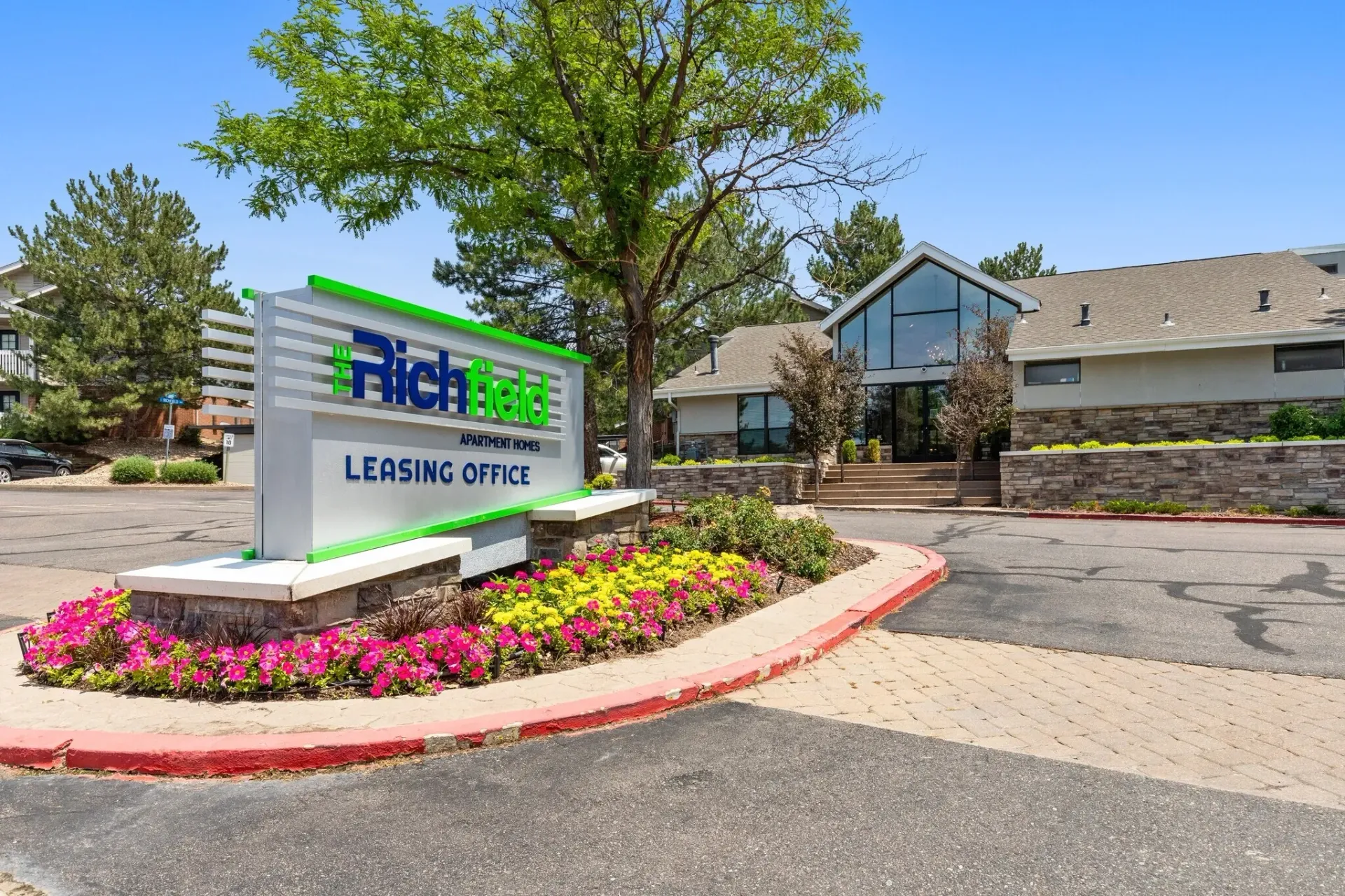 The Richfield Apartment Homes leasing office signage and building exterior.