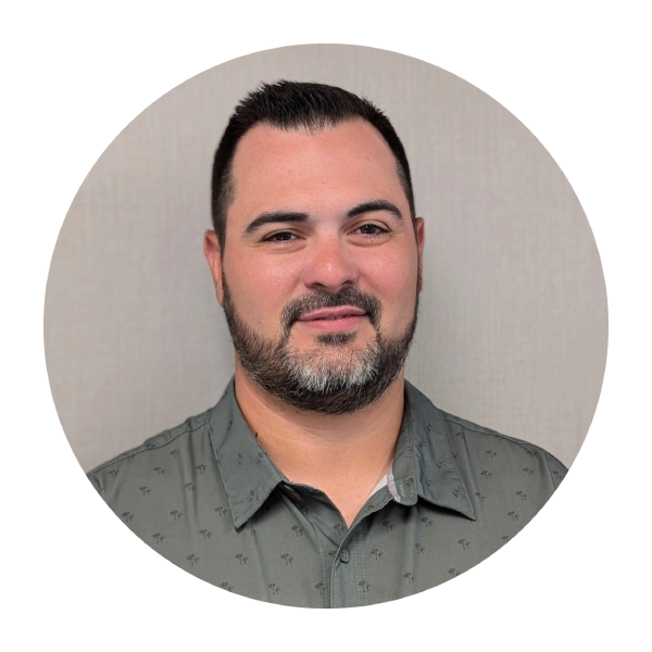 A silhouette of a person in a circle on a white background.