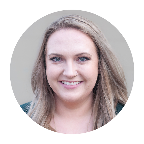 A woman with long blonde hair is smiling in a circle.