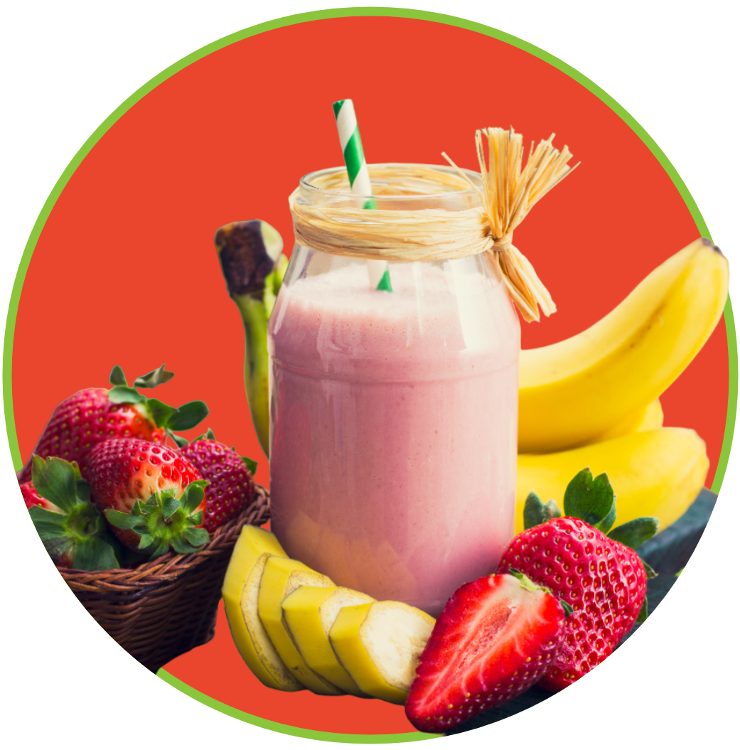 a pink smoothie in a jar surrounded by bananas and strawberries