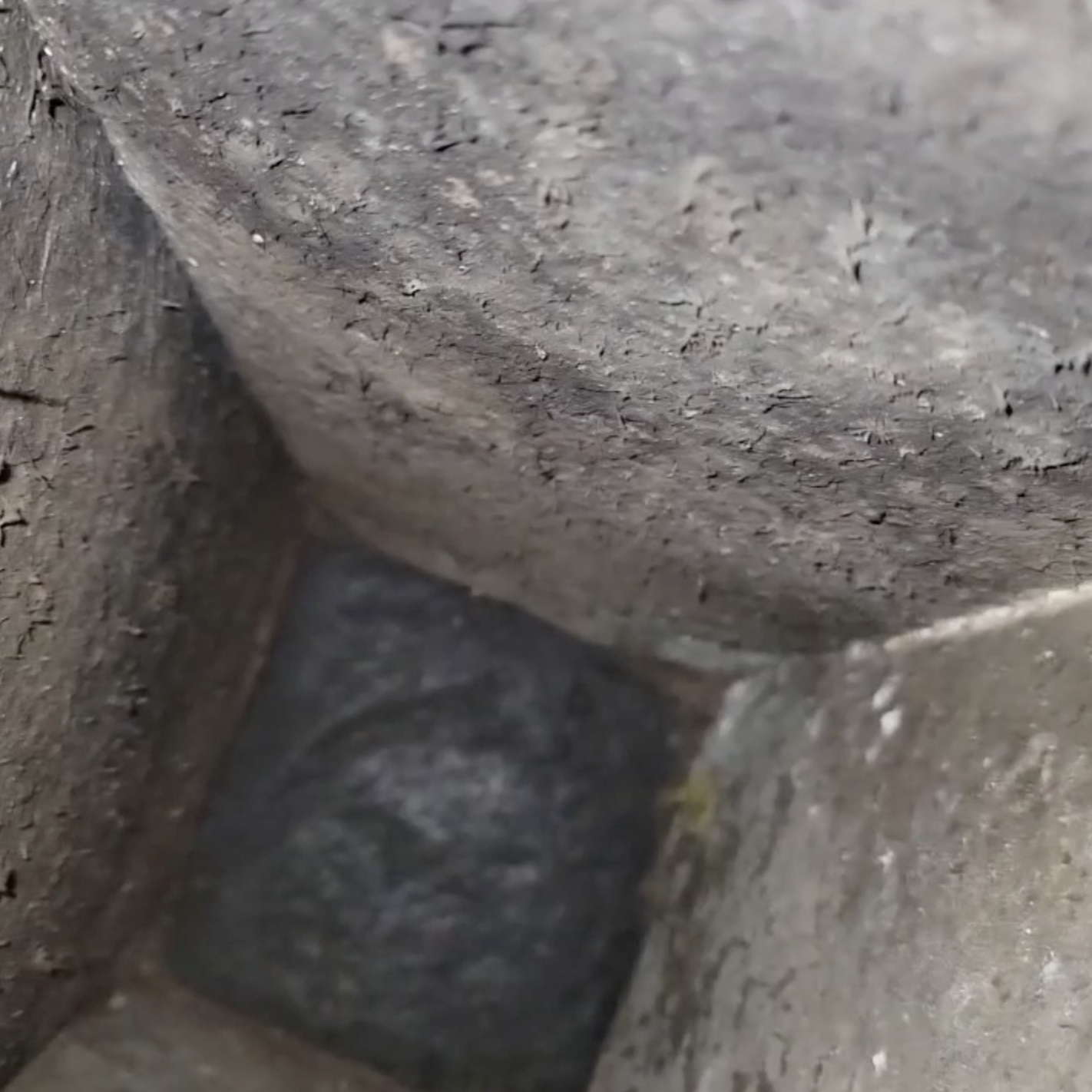 The inside of a dirty air vent.