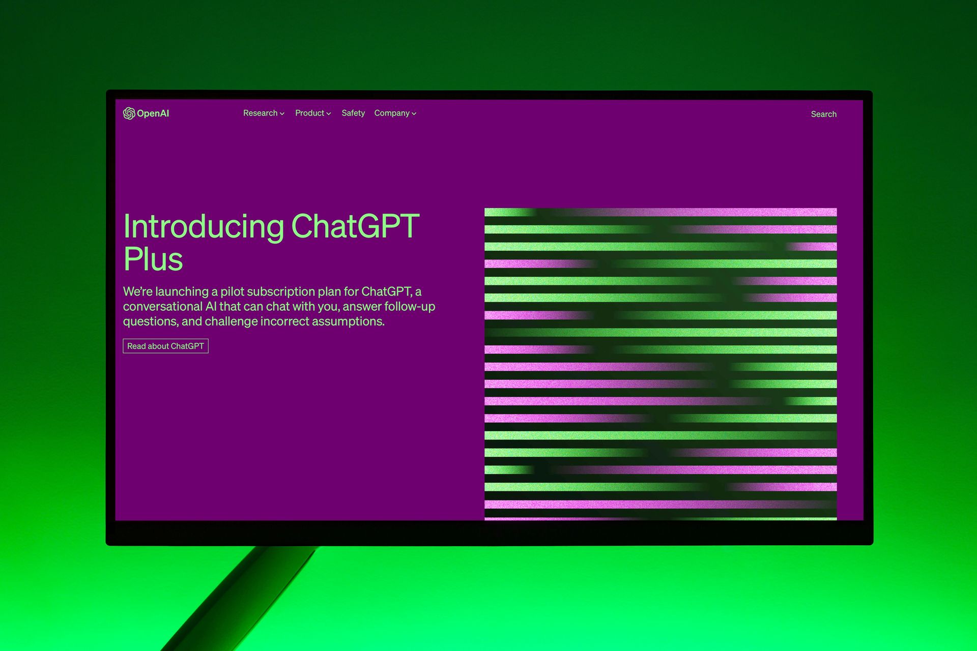 A computer monitor with a purple screen that says introducing chatgpt plus