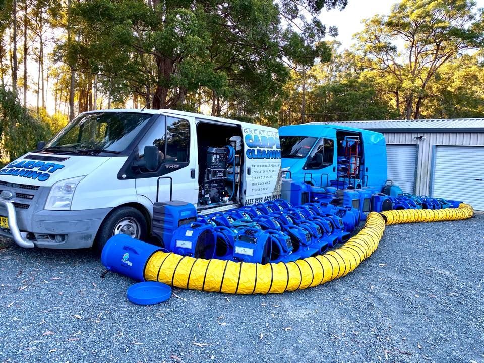 A White Van is Parked With a Yellow Hose Attached to It — Great Lakes Carpet Cleaning & Restoration In Hallidays Point, NSW