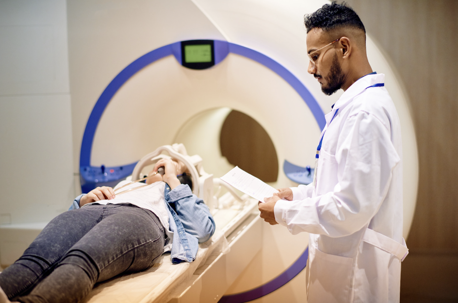 A person undergoing an MRI scan of the lumbar spine to diagnose and assess sciatica, providing detailed imaging for medical evaluation.