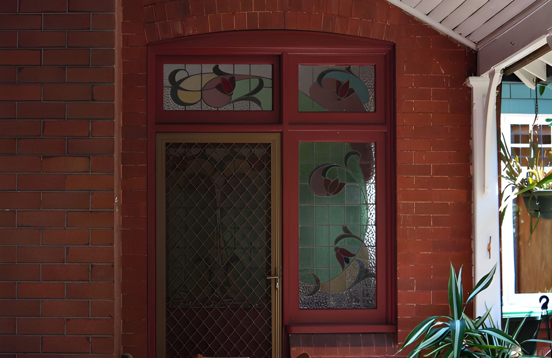 Stained Glass Detail Above Screen Door, Side Panel With Floral Design — K & J Glass in Kempsey, NSW