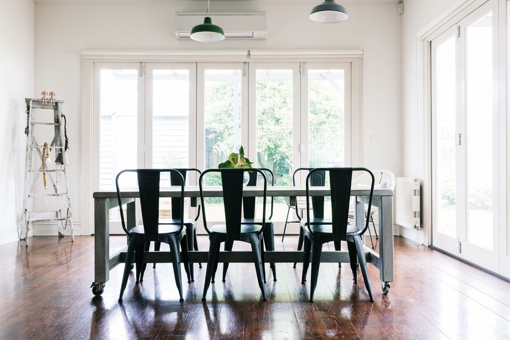Dining Room with Black Chairs, and Large Windows — K & J Glass in Warrell Creek, NSW