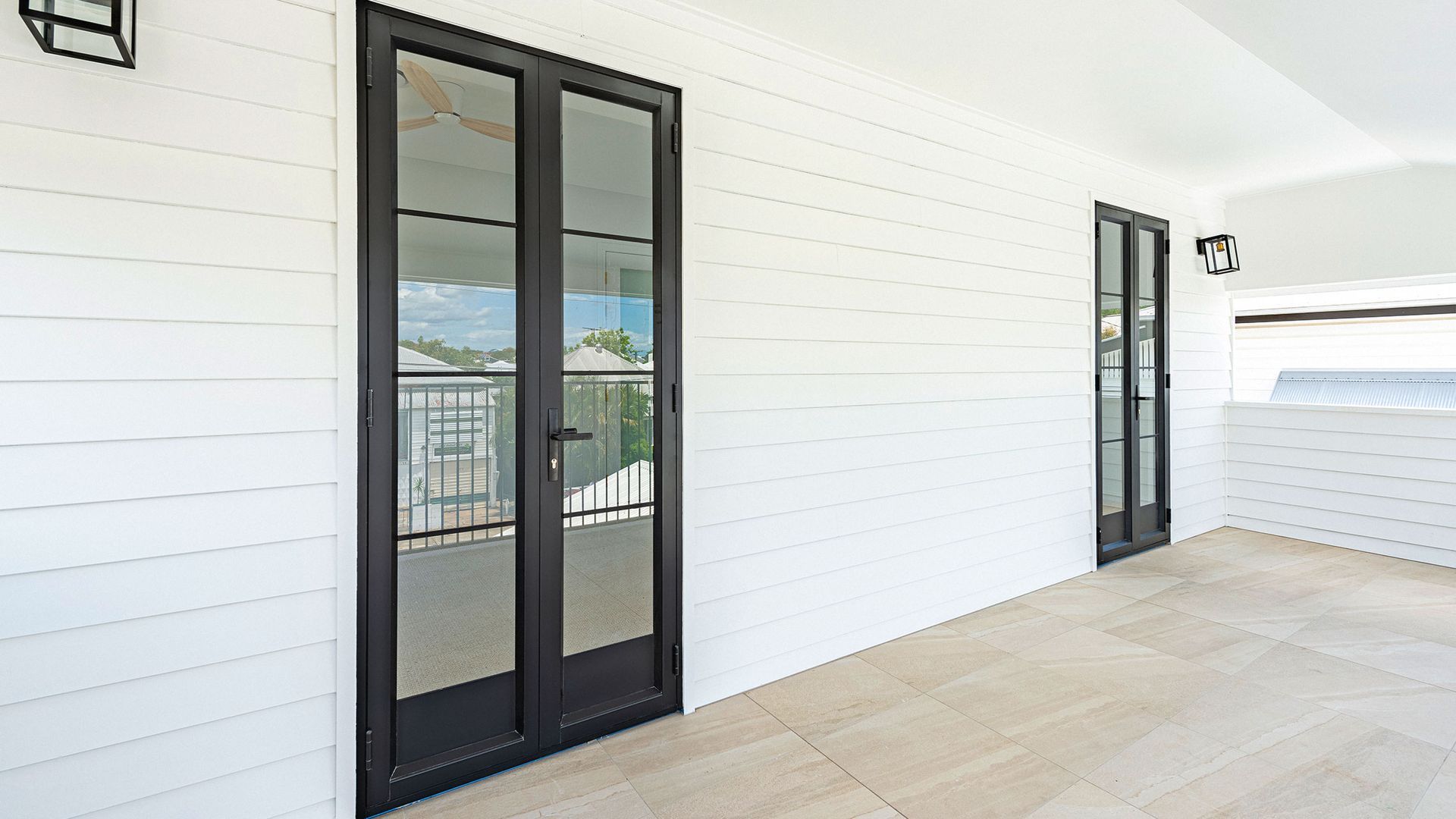 Black-Framed Glass Doors on White Shiplap Wall — K & J Glass in Crescent Head, NSW