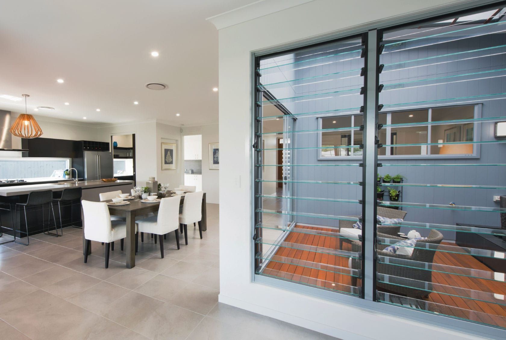 Modern Home Interior With Glass Louvre Windows — K & J Glass in Warrell Creek, NSW