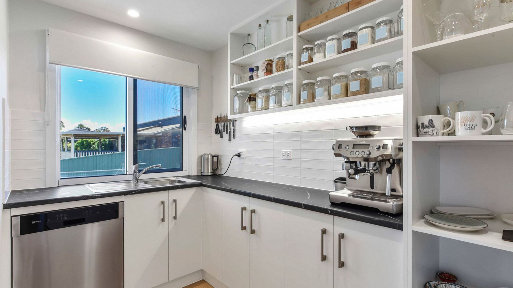 Modern Kitchen With Sliding Windows — K & J Glass in Warrell Creek, NSW