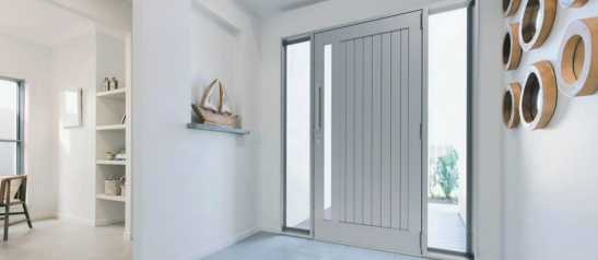 Grey entrance door — K & J Glass in Warrell Creek, NSW