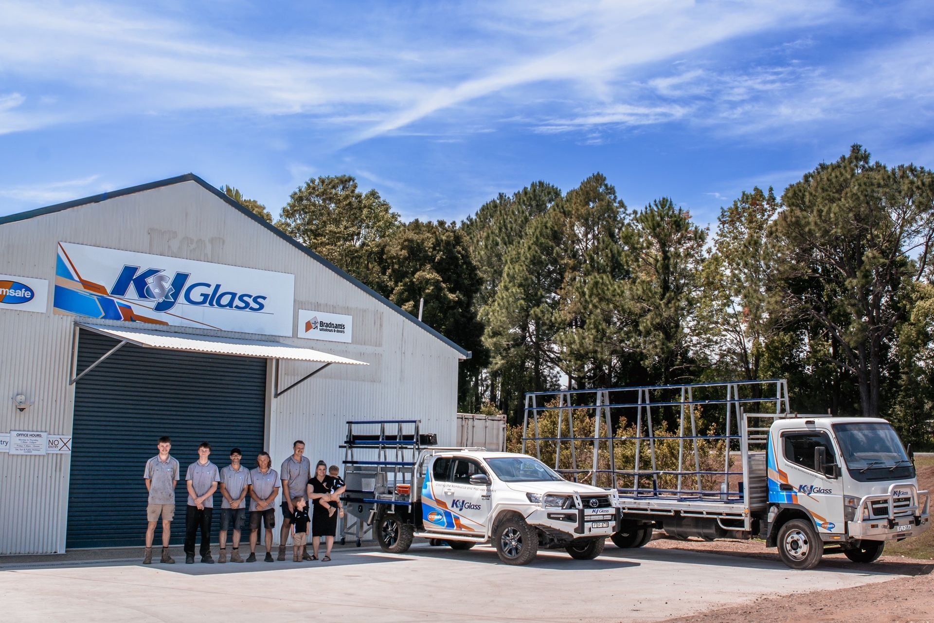 Group of People Outside K & J Glass Building — K & J Glass in Warrell Creek, NSW