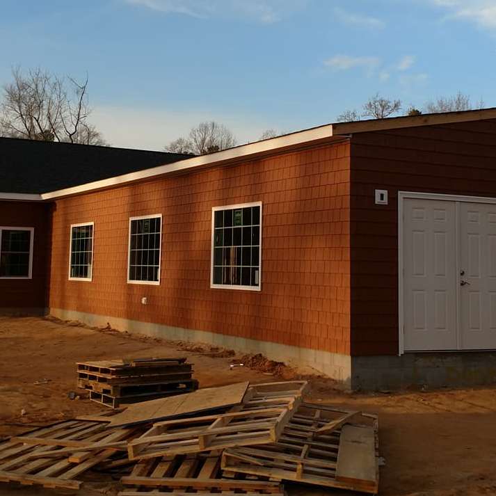 new windows installed on orange house