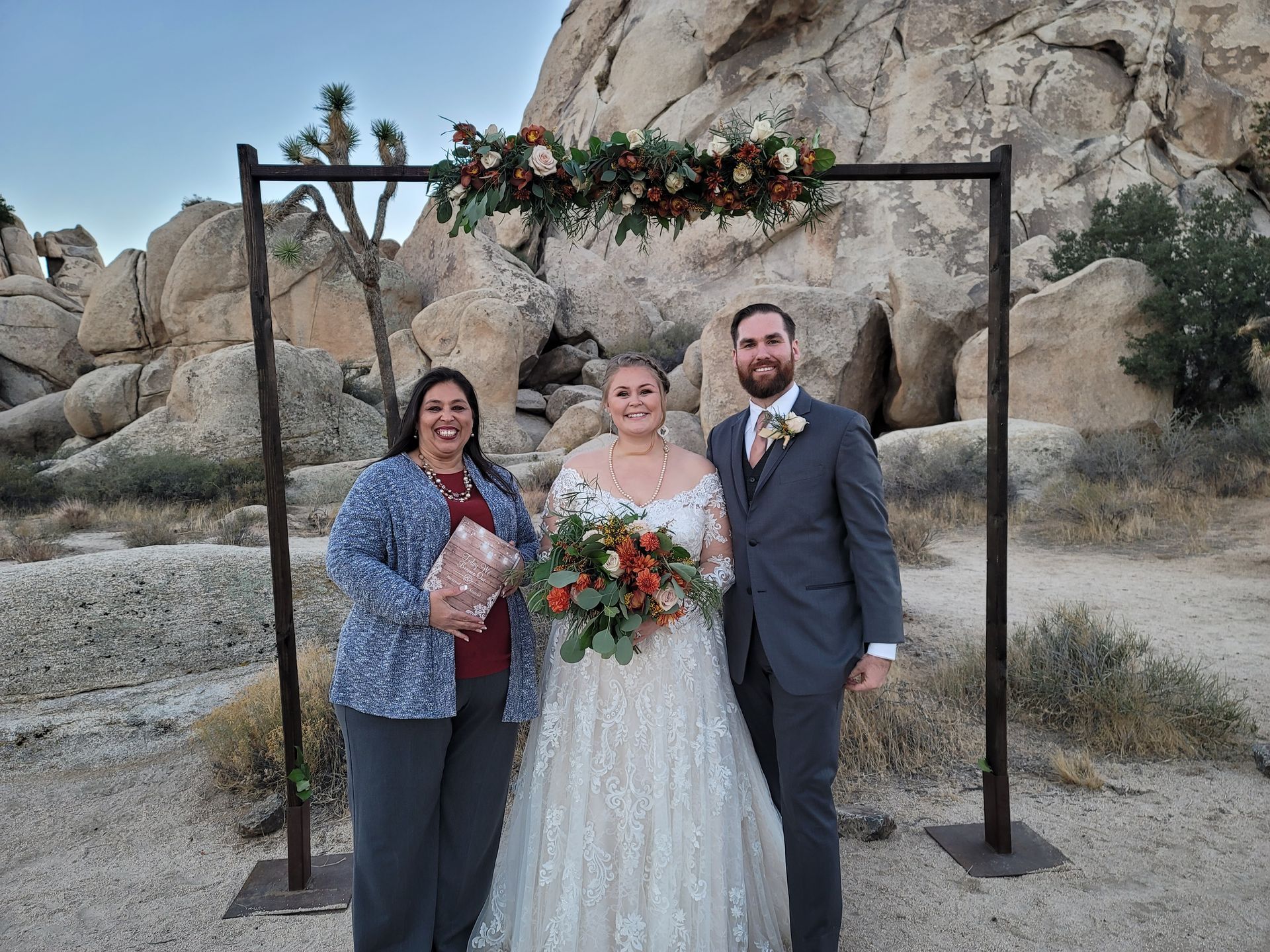 Rev. Jen celebrating an Elopement with a couple in Joshua Tree National Park.