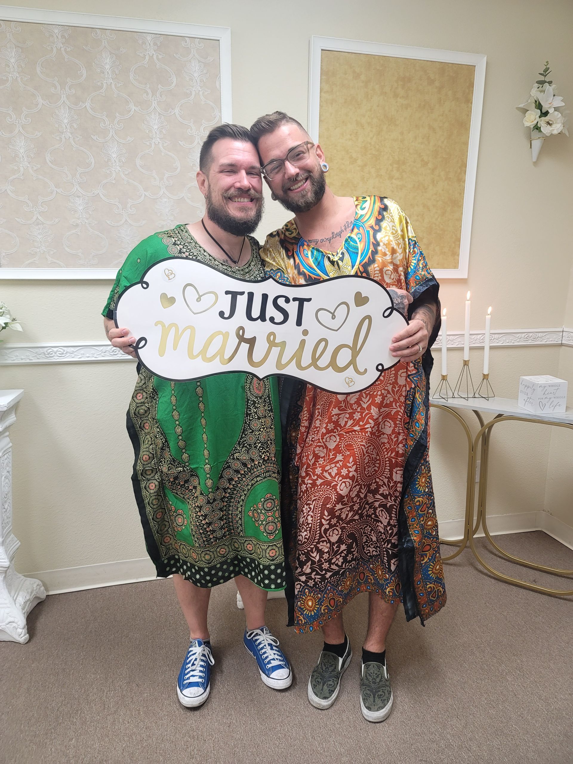 Just Married Couple holds sign after their Elopement Ceremony in Rancho Mirage